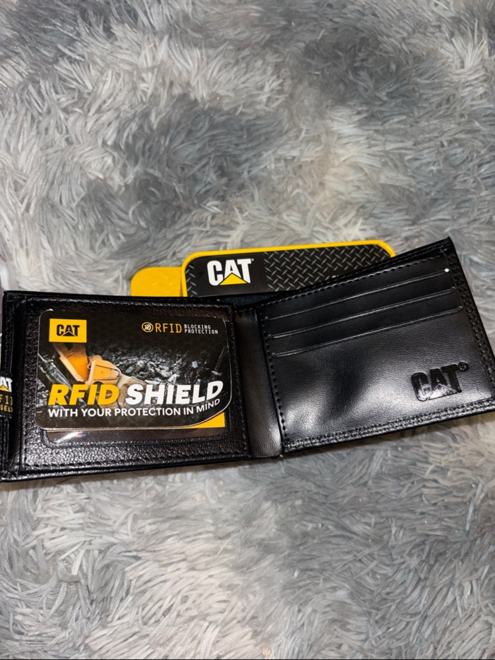 CAT Genuine Leather Black Tri-Fold Wallet with Yellow Tin RFID - Picture 3 of 7